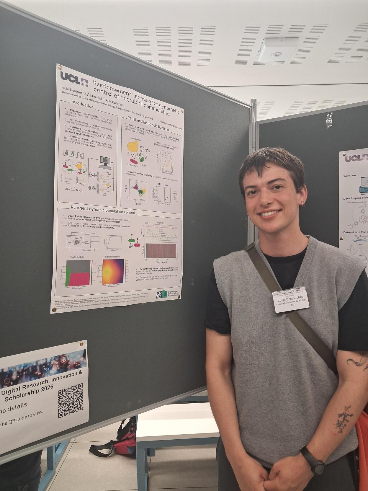 Louie and his poster at the Festival of Digital Research