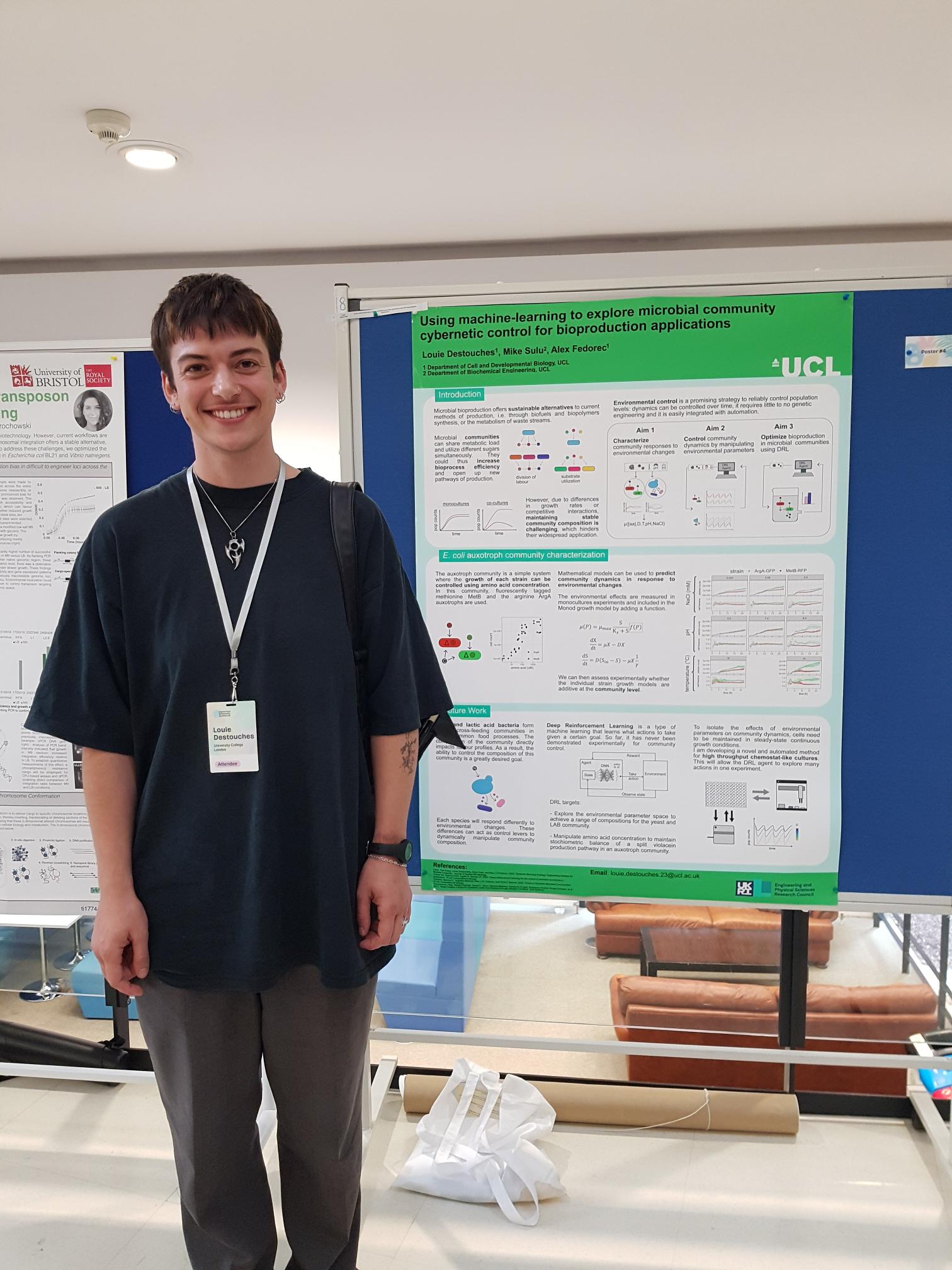 Louie presenting a poster